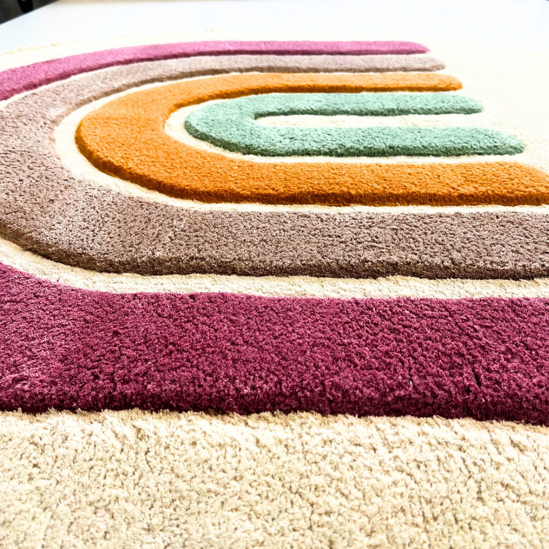 Kids carpet for girls room A white cotton rainbow carpet with colorful rays 